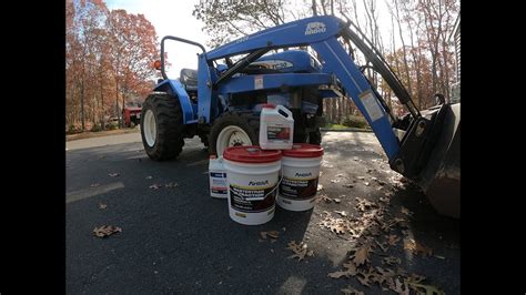 drain hydraulic fluid new holland skid steer|new holland hydraulic fluid.